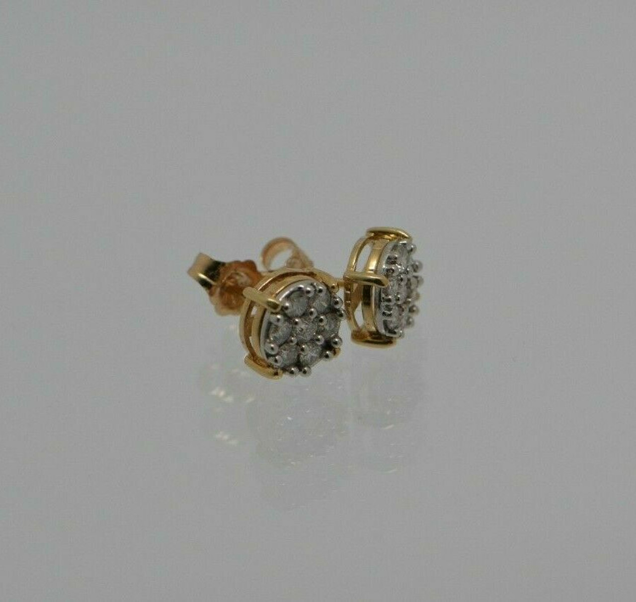 10 Karat White Gold 1.0 Carat 7 Stone Flower Diamond Stud Ea | Rialto  Jewelry | San Antonio, TX